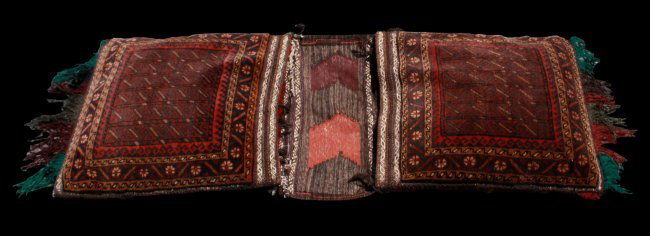 EARLY 19TH C. AFGHAN HORSE SADDLE: EARLY 19TH C. AFGHAN HORSE SADDLE. MEASURES 53" X 20"