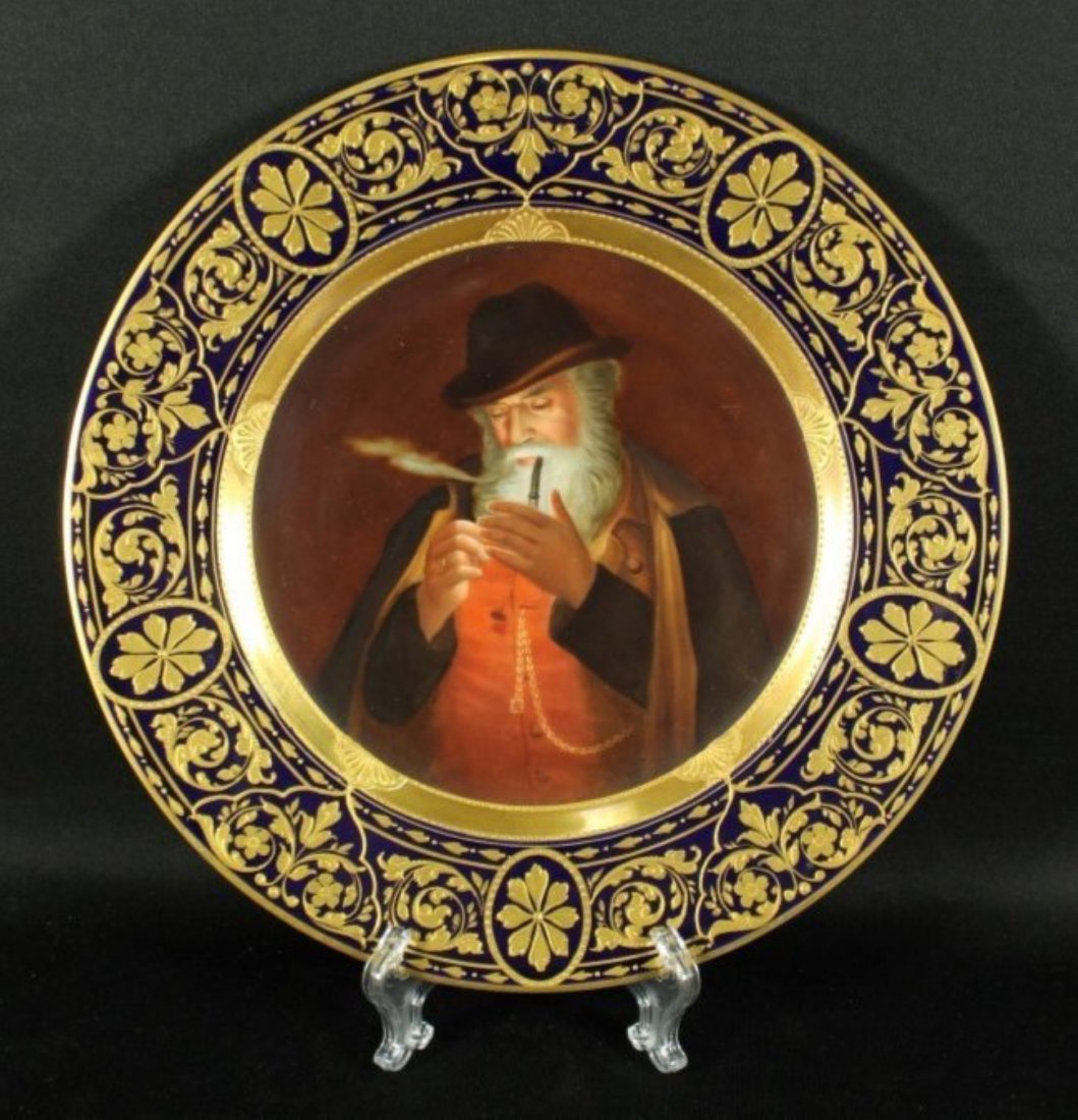 19TH C ROYAL VIENNA PLATE OF AN ELDERLY MAN LIGHTING: 19TH C ROYAL VIENNA PLATE OF AN ELDERLY MAN LIGHTING PIPE. IT MEASURES 9 1/2" DIAMETER. NO INTERNATIONAL SHIPPING ON IVORY