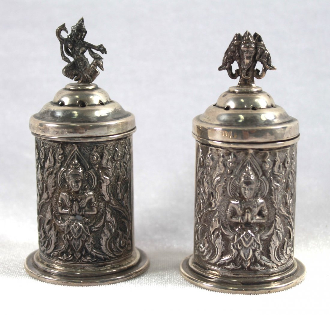 PAIR OF STERLING SILVER SALT SHAKERS: PAIR OF STERLING SILVER SALT SHAKERS. MEASURES H: 3 1/4". TOTAL WEIGHT IS 68 GRAMS