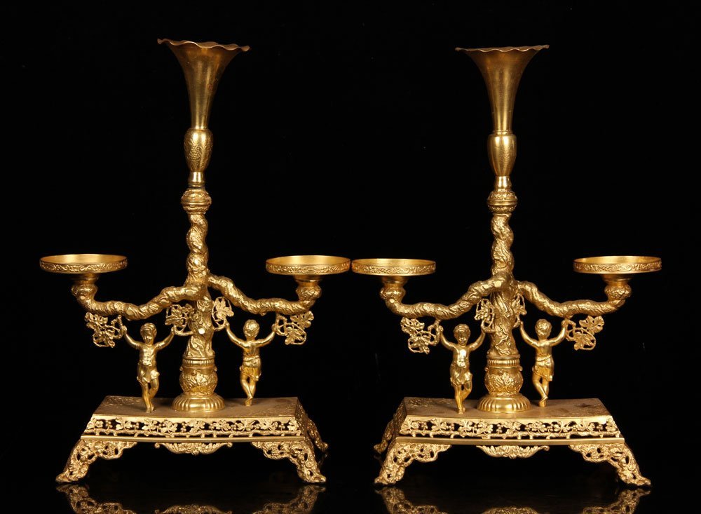 Pair of 19th C. Classical Epergnes: Pair of 19th C. Classical Epergnes. Pair of 19th century classical epergnes, signed "Pairpoint" on bottom, decorated with dancing cherubs, tree trunk and branches with leaves of berries, 20 1/2" h x 1