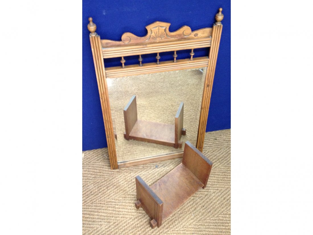 An Edwardian wall mirror together with 1920's styl: An Edwardian wall mirror together with 1920's style bookends.
