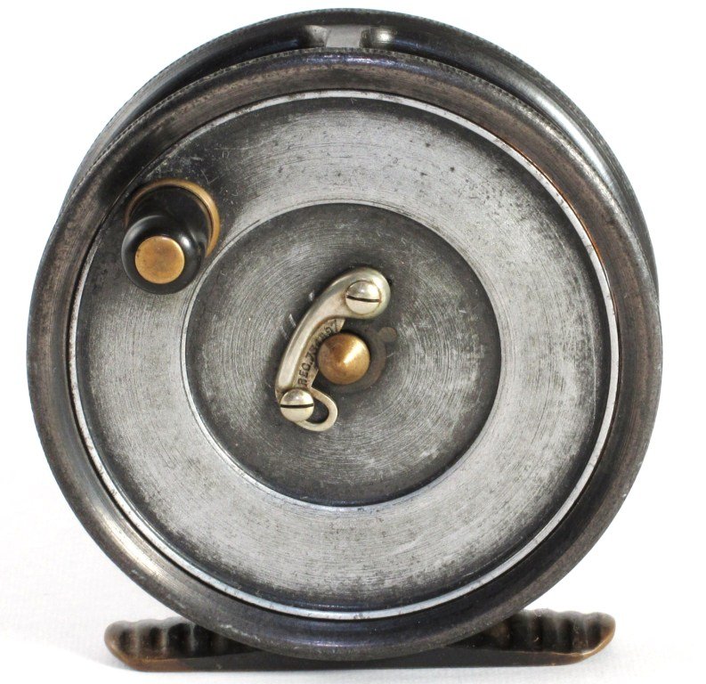 Hardy Uniqua Trout Reel: Size 2 7/8", duplicated Mark II, small oval plate fixed to inside of reel, "Made for Abercrombie & Fitch Co, New York". This Very Good plus condition example has finish wear, ribbed brass foot and tel