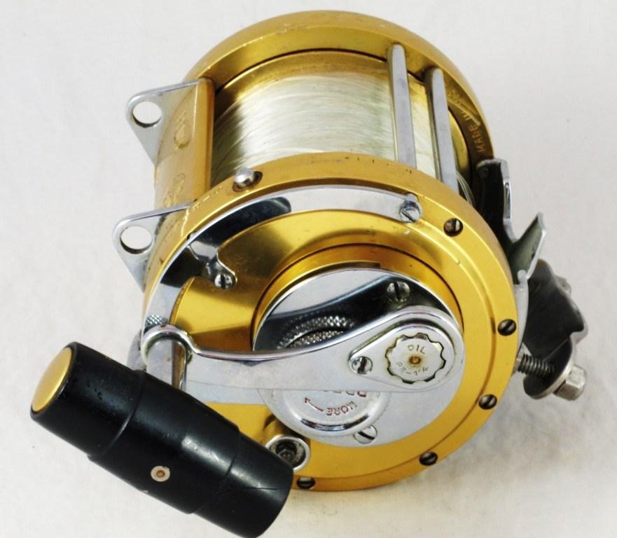 Penn International 50w Big Game Reel: Vintage right handed reel. Cosmetically, there are a few scratches, but nothing deep or major. Mechanically sound the handle cranks smoothly, while the free spool spins freely. The clicker clicks loud