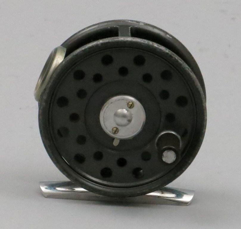 Hardy St. George Jr. Trout Reel: 2 9/16" dia. and 3/4" width spool. A small trout reel made in England, shows signs of honest wear to the rims and side plate, no cracks in the white gray agate ring and spool is tight with no wobble,