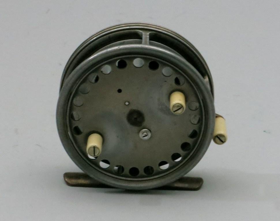 Hardy Silex Bait Casting Reel Marked "The Silex Major": 3 1/4" dia. and 7/8" spool width. A rare early reel with original twin Ivorine handles and cross pillar brake with Ivorine handle, an early tension screw indicator and original brass foot. Much of the
