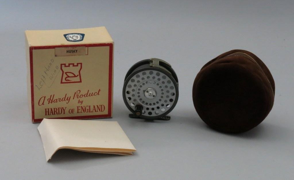 Hardy Husky Left Hand Wind in Original Box: This 3 3/8" diameter reel has a 1 1/8" wide spool. Comes with a suede pouch and original Box with silent check instructions. In Very Good plus condition "Left Hand Wind" written on the box, otherwise 