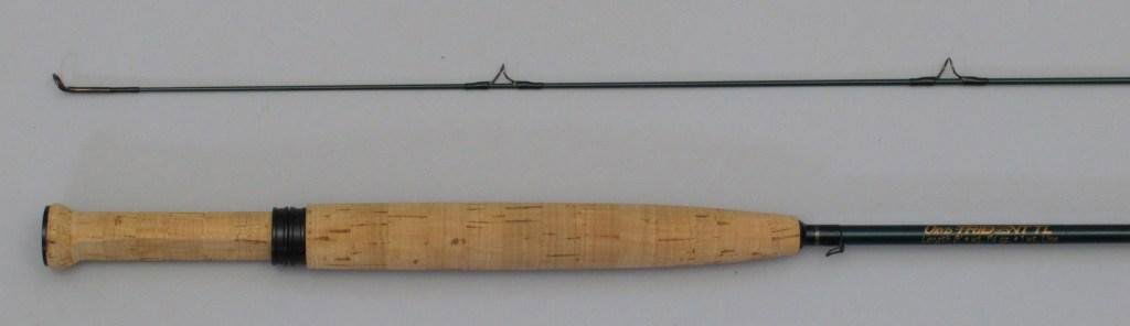 Orvis Trident TL Graphite Trout Rod - 8', 2/1, 1wt: Mid Flex 8.0 1 3/4oz. A small stream trout rod with cigar grip and slide band cork reel seat on a handsome dark green blank. The rod is in Excellent near new condition with original tube with protecti