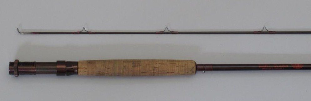 Scientific Anglers System G 7 - 8' 4", 2/1, 7 wt.: Serial no. G3787. The rod is a rich mahogany colored blank with brown wraps, up-locking brown aluminum with walnut spacer and a metal spigot style ferrule. These were fast action models for big Alaska