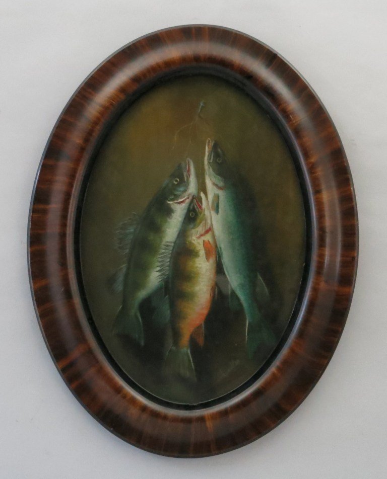 Early Pastel of 3 Hanging Fish in Original Oval Frame: Signed "Chandler", this piece features a pair of yellow perch and a pickerel. Typical of the late nineteenth century works, this pastel and frame are in Excellent condition save for lacking the old ba