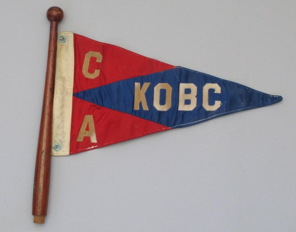 Nice Old Vintage Yacht Pennant with Mahogany Post: This 16" pennant has the letters"KOBC" sewn on to it. Condition is Very Good plus.