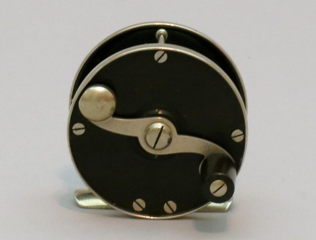 Edward vom Hofe Peerless Reel 3 1/2": Peerless model 355 German silver and hard rubber trout reel, 2 3/8" dia. & 13/16" wide, marked on oil cap, EDW vom HOFE - MAKER - FULTON ST NY, crank side hard rubber face plate has some very light sc