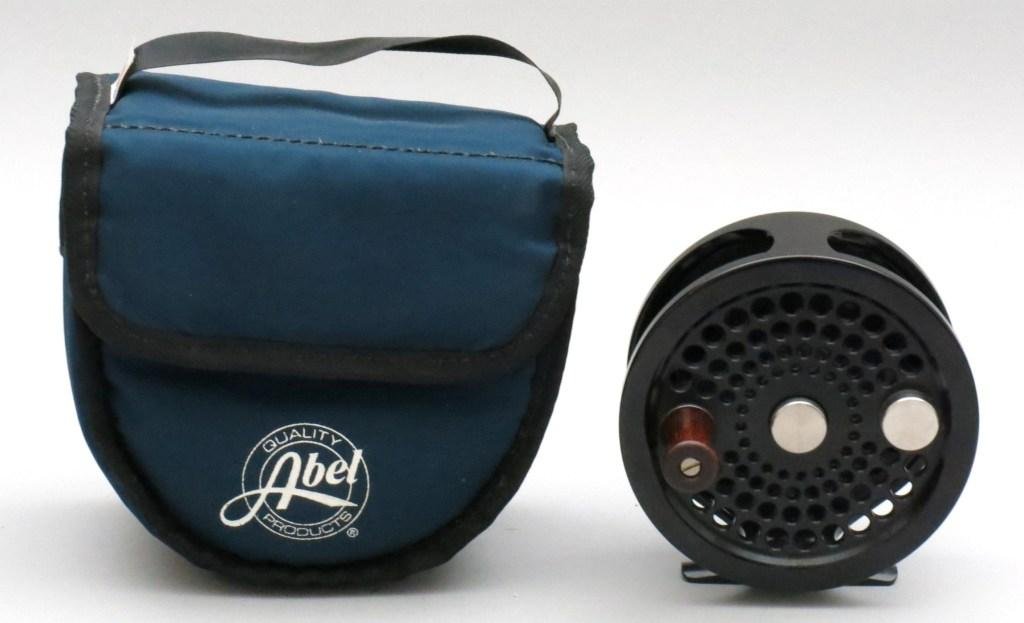 Abel No. 4 Salmon Reel: A lightly used standard arbor reel in black finish marked with serial # 7052, 3.9" dia. & 1 3/8" spool width, LHW, designed for a 11/12/13wt rods, capacities: 360 yards of 30# backing with a 11wt, 330