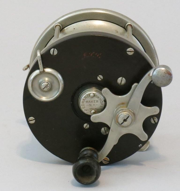 Edward vom Hofe Model 621 - 6/0: German silver and hard rubber salt water reel, size 6/0 - 4 1/4" dia. & 2 1/8" spool width. The oil caps have makers mark & PAT. MAY.20. 02, the serial number H219 is marked on foot and the reel is in