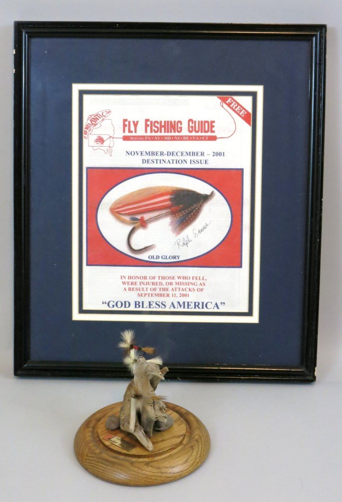 Three Flies and Signed Cover by Ralph Graves: Three Wulff Patterns tied by Ralph Graves and displayed in a glass dome. Accompanied with a framed magazine cover from Fly Fishing Guide Magazine with Mr. Graves' "Old Glory" pattern featured on the c