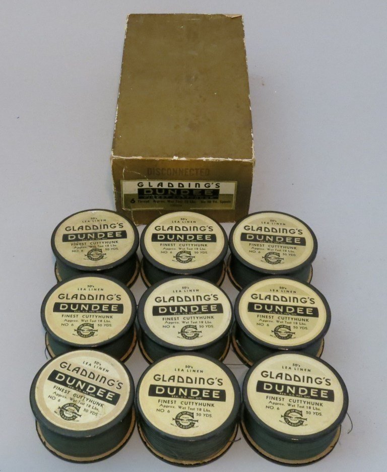 Full Box of Nine Gladding's Dundee Cuttyhunk Line: 18 lb. test and 50 yd. spools. All are in Fine condition and appear unused and comes in the top of the original box, which has some edge wear.