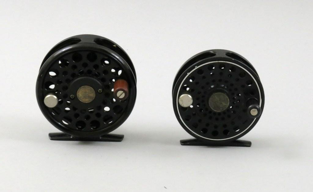 Two STH Fly Reels: One reel at 3 1/8" dia. and 3/4" spool width; a Cayuga model with Teflon/brass disc drag and exposed rim, designed for 3/4/5 lines, RHW or LFH with no tools, Very Good condition. The other reel is a S
