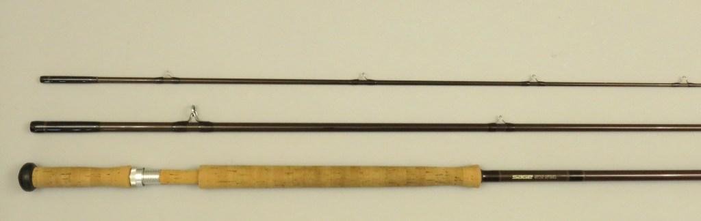 Sage Spey Rod 14'- 3/1, 10wt: This three piece rod, a GFL-10140-3 has seen light use, the cork is slightly soiled and the tip ferrule has a quarter inch section where some threads show, an easy fix with epoxy. Rod is in Very Good 