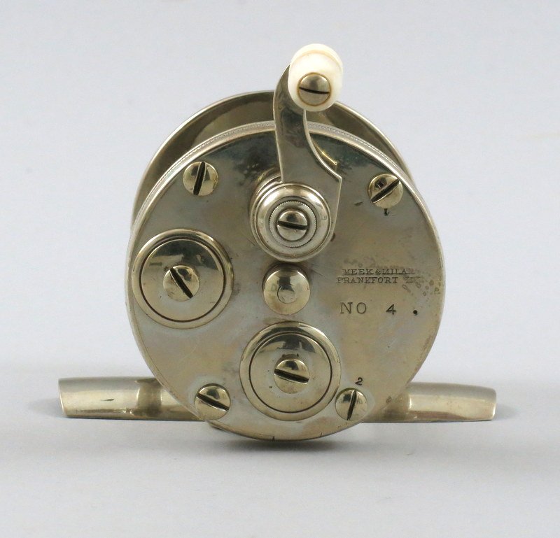 Meek & Milam No.4, Numbered Screw Reel: Rare Meek & Milam , Frankfort, Ky., no.4 high grade, pre-serial number German silver reel. Two screws are numbered on the face plate, half handle with ivory grasp in the 12 o'clock position, unaltered