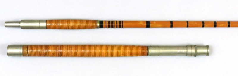 H.L. Leonard Salt Water Rod 7' 3 1/2" 2 Piece: Sliding band reel seat, six sided, with full intermediate brown wraps, opposing trumpet guides and rattan grip. Marked "The / H.L. Leonard / Rod / Leonard XXXX / Makers, and "Pat. May 31, 1880" on opp