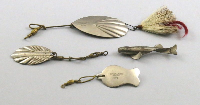 Group of Four Metal Lures: Includes two Excellent "Crusader" marked blades, no.9561 and no.9539, a Loftie blade and an unrigged Geen's bait marked "Geen's Patent 2102".