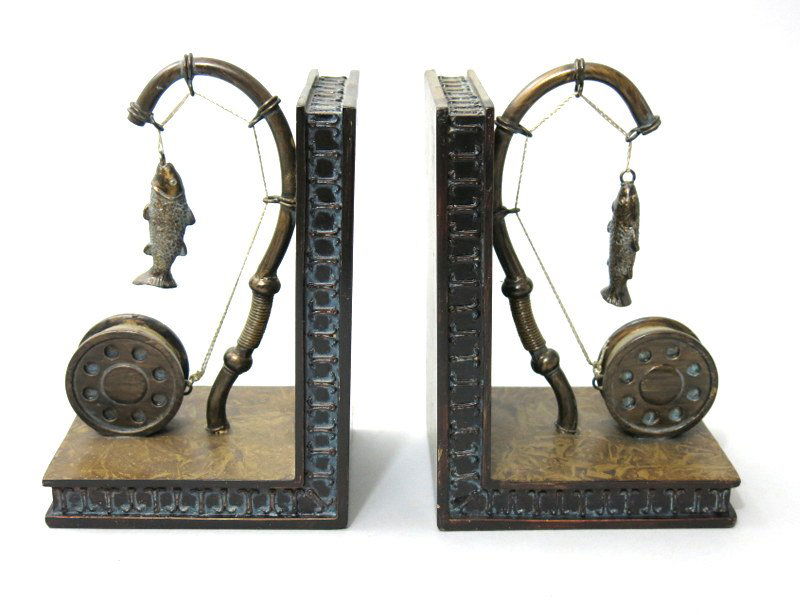 Pair of Bookends: Rod and reel design with a fish tied on a rope line. Composed of composite plastic with 5" x 7" dimensions. Very Good plus.