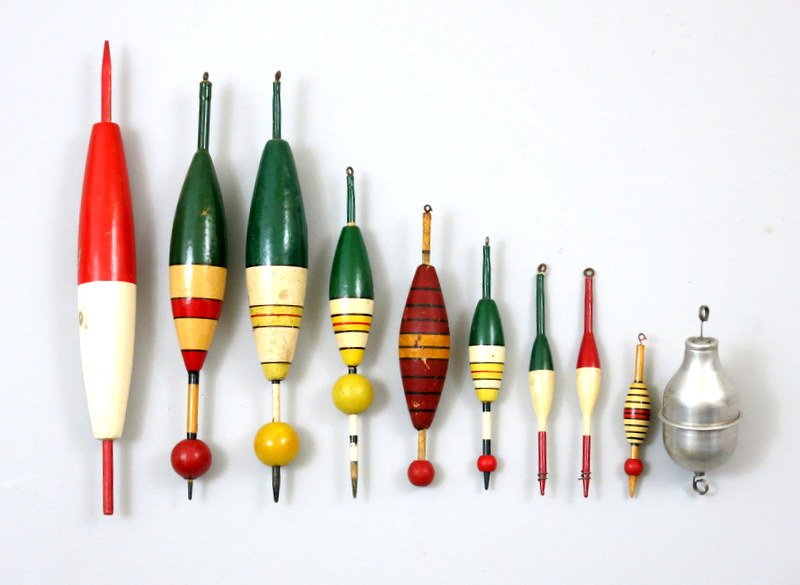 Ten Fishing Floats: Nice mixed offering of fishing floats, with some of the Ideal example. Ranging in size from 4" to 12". Included is an interesting unmarked aluminum example. Very Good - Very Good plus.