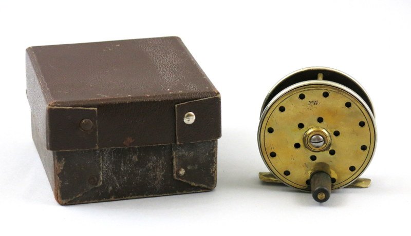 Jardine Brass, Silver and Ebonite Fly Reel: Ca. 1885 brass spooled Jardine Single Action Trout Reel with "Patent No18817" stamped into the face plate coming from Reuben Heaton Ltd. Includes a 2 1/2" diameter and 7/8" wide pillared arbor spool, 