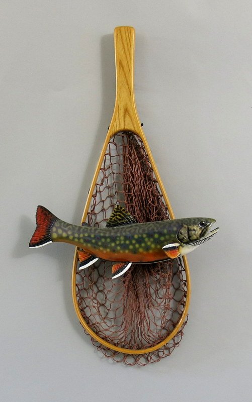 Handcarved Trout and Net by Kurt Vitch: The artist hails from upstate New York and has been featured in many magazines around the world and won numerous awards for his work including the Fish in the World - Freshwater Fish - Single in 1992 