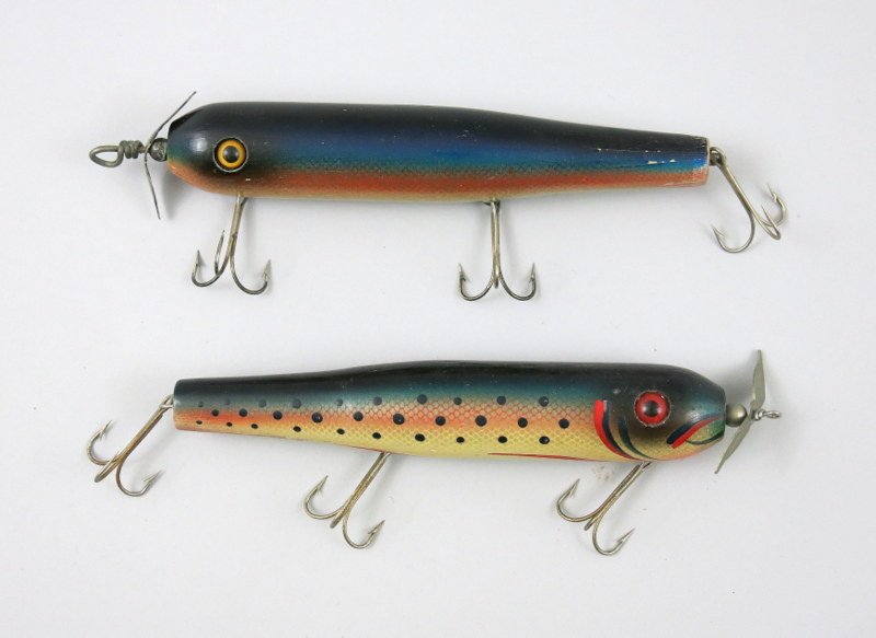 Pair of Emerson Rhuren Striper Baits: Measuring 6 7/8" these two glass eyed lures are both in Excellent minus condition. Hardware appears to have avoided saltwater, eyes are perfect and paint is Excellent minus.