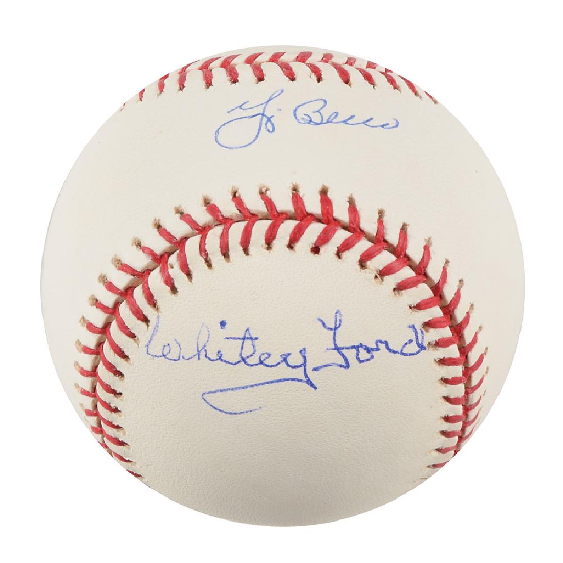 Yogi Berra and Whitey Ford: Official Rawlings Major League (Selig) baseball signed in blue ballpoint on the sweet spot by Yogi Berra, and on the lower panel by Whitey Ford. In very fine condition, with an MLB authentication holo