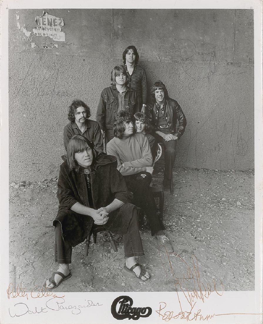 Chicago Signed Photograph: Rare and desirable vintage glossy 8 x 10 publicity photo of the classic 'rock with horns' band Chicago, signed in ballpoint by Peter Cetera, Terry Kath, Walter Parazaider, Danny Seraphine, Lee Loughna