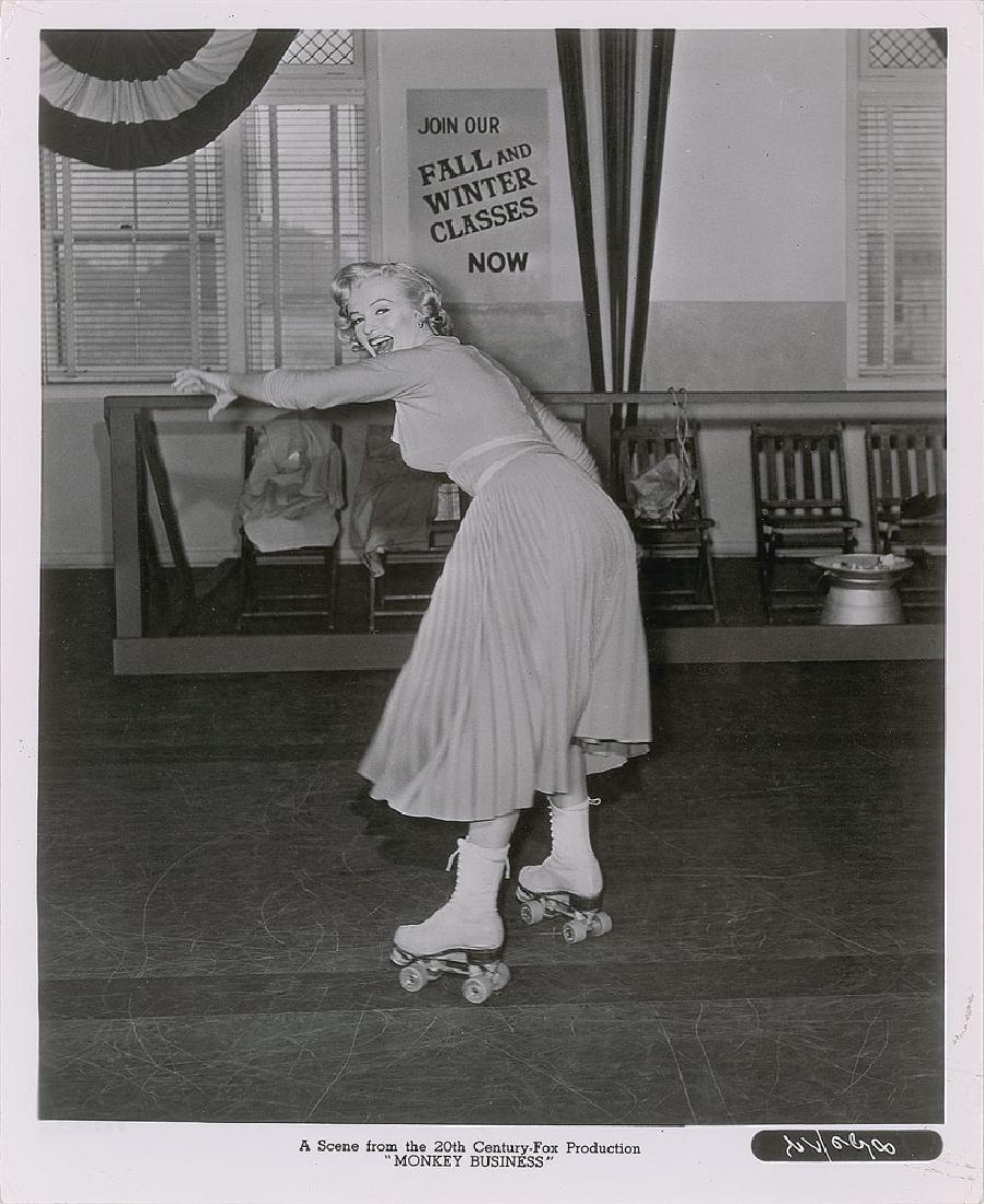 Marilyn Monroe Original Vintage Photograph: Original vintage glossy 8 x 10 20th Century-Fox publicity photo for the 1952 film Monkey Business, showing Monroe on roller skates. Reverse bears a Culver Pictures stamp. In fine condition, with minor