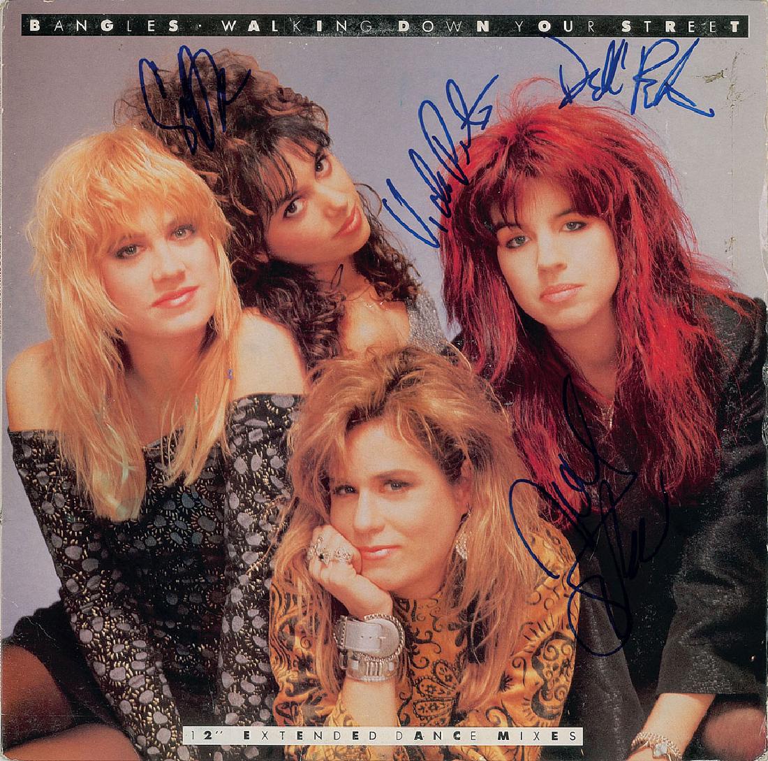 Bangles Signed Album: 'Walking Down Your Street' promotional single album signed on the front cover in blue felt tip by Susanna Hoffs, Vicki Peterson, Michael Steele, and Debbi Peterson. In very good to fine condition, wit