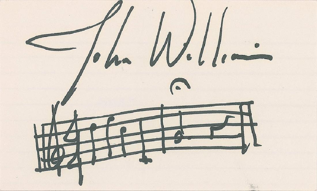 John Williams: AMQS on a white 5 x 3 card, prominently signed across the top, "John Williams." Williams pens two closing bars from one of his classic works. In fine condition.