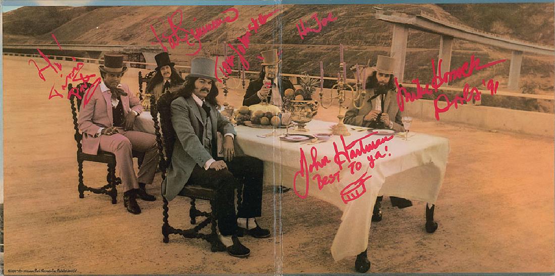 The Doobie Brothers: The Captain and Me album signed and inscribed on the inner gatefold in red paint pen, "Hi Joe, Tom Johnston," "Pat Simmons," "Hi! Tiran Porter," "John Hartman, Best to ya!," adding a small snare drum,