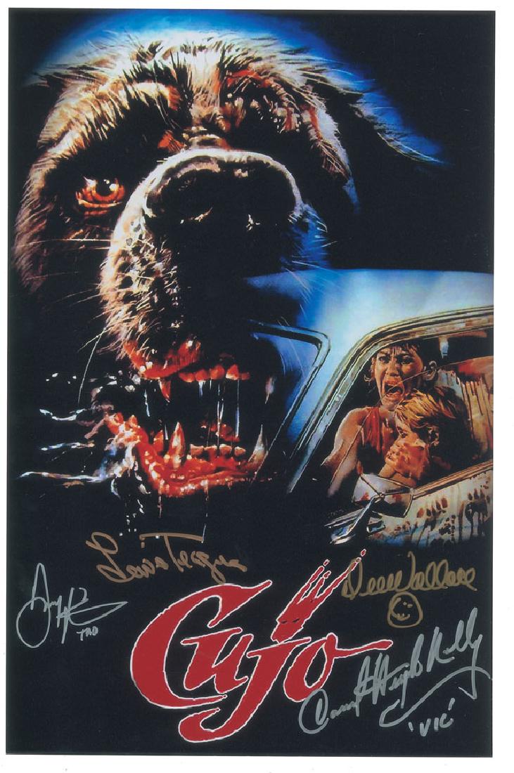 Cujo: Color semi-glossy 11 x 17 photo of the poster for the 1983 Stephen King adaptation Cujo, signed in gold ink by Dee Wallace and Lewis Teague, and in silver ink by Danny Pintauro and Daniel Hugh-Kelly,