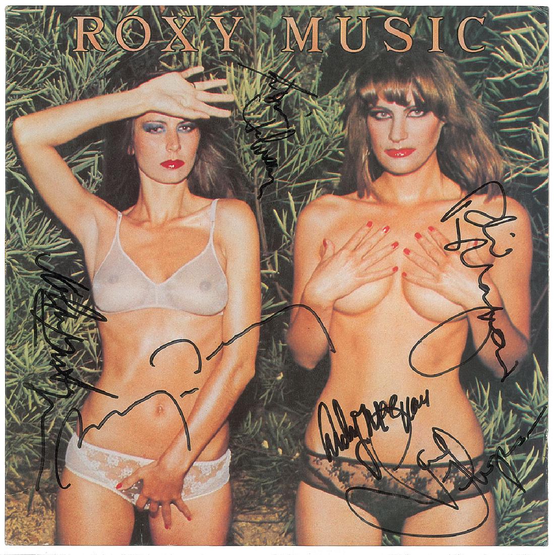 Roxy Music Signed Album: Country Life album signed on the front cover in black felt tip by Bryan Ferry, Phil Manzanera, Andy Mackay, Paul Thompson, and John Gustafson, and Eddie Jobson. In fine condition. The record is not in