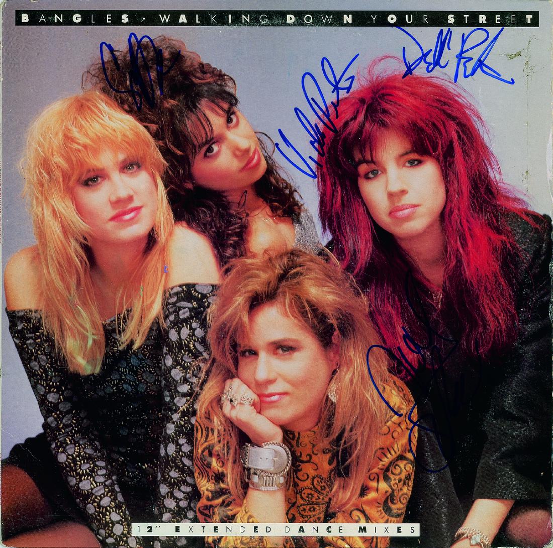 Bangles Signed Album: 'Walking Down Your Street' promotional single album signed on the front cover in blue felt tip by Susanna Hoffs, Vicki Peterson, Michael Steele, and Debbi Peterson. In very good to fine condition, wit