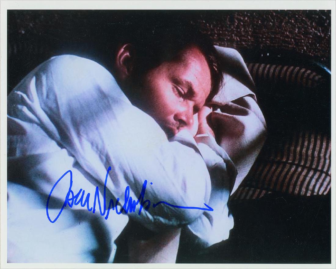 Jack Nicholson: Color satin-finish 15 x 12 photo of an exhausted Nicholson lying down with his hands under his head, signed in blue felt tip. In fine condition. Provenance: From The John Brennan In-person Autograph C