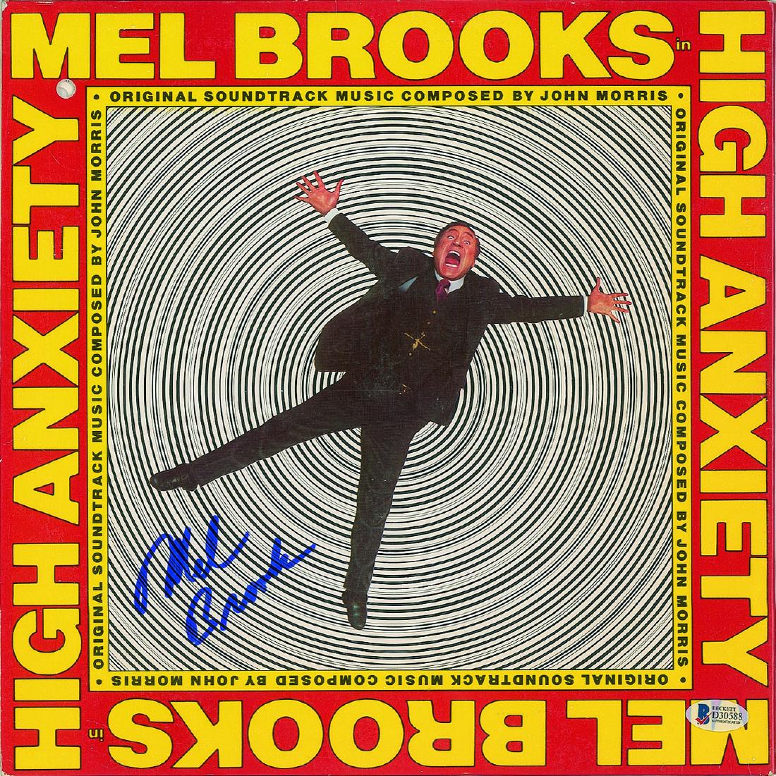 Mel Brooks: High Anxiety soundtrack album signed on the front cover in blue felt tip by Brooks. In fine condition, with a punch hole to the upper left corner and a Beckett authenticity label affixed to lower righ