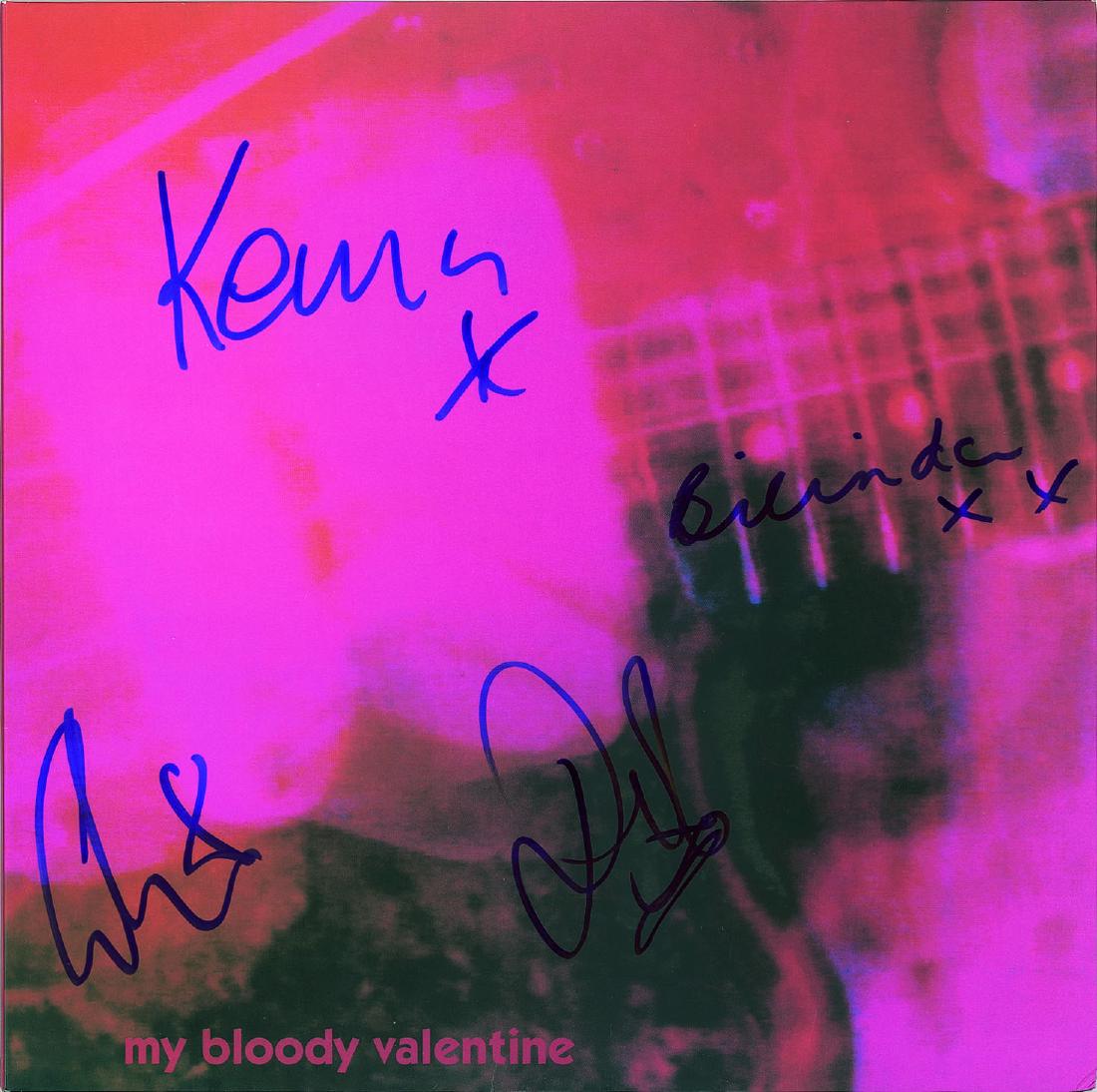 My Bloody Valentine Signed Album: Sought-after Loveless album signed on the front cover in blue felt tip Colm Ó Cíosóig, Bilinda Butcher, Debbie Googe, and Kevin Shields, each signing first name only. In fine condition.