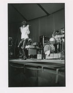 The Doors Original Photograph: Original semi-glossy 11 x 14 silver gelatin photo of Jim Morrison at London's Roundhouse in 1968, printed from the original negative circa 2002. Reverse bears an Ethan Russell credit label. In fine co