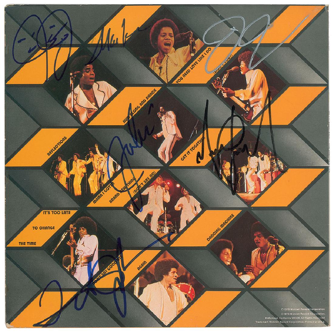 The Jackson 5: Get It Together album by The Jackson Five, signed on the back cover in black felt tip by Michael Jackson, and in silver ink or blue felt tip by Marlon, Jackie, Tito, and Jermaine Jackson, who signs tw