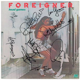 Foreigner: Head Games album by Foreigner, signed on the front cover in black felt tip by Lou Gramm, Dennis Elliott, Al Greenwood, Ian McDonald, Mick Jones, Rick Wills, and Kelly Hansen, with one adding an inscri