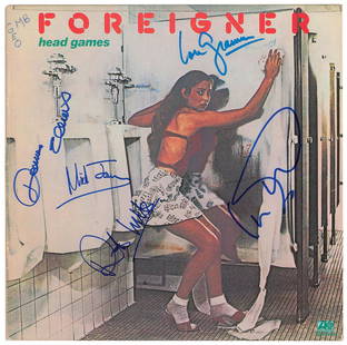 Foreigner: Head Games album by Foreigner, signed on the front cover in blue felt tip and paint pen by Lou Gramm, Dennis Elliott, Ian McDonald, Mick Jones, and Rick Wills. In very good to fine condition, with cle