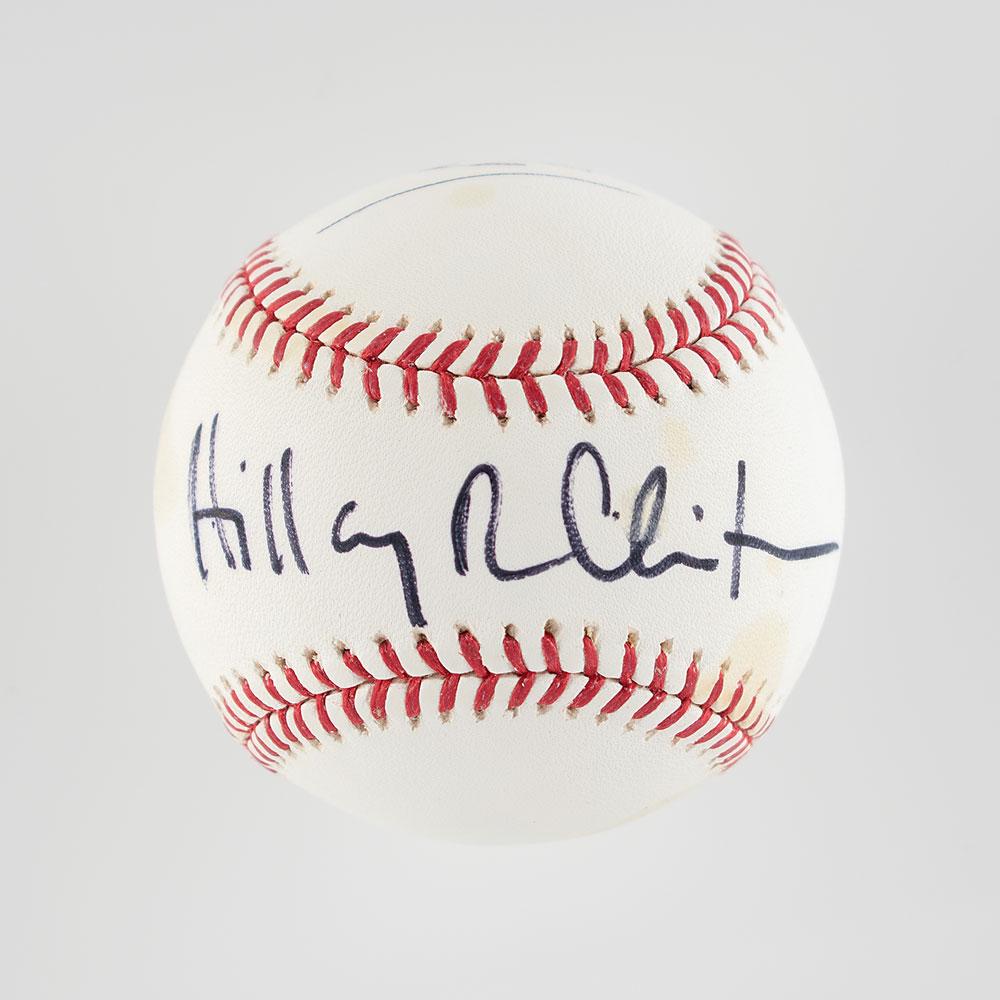 Joe Biden and Hillary Clinton: Official Rawlings Major League (Selig) baseball signed in black felt tip on the sweet spot, "Hillary R. Clinton," and on a side panel in black ballpoint, "Joe Biden." In very good to fine condition, w