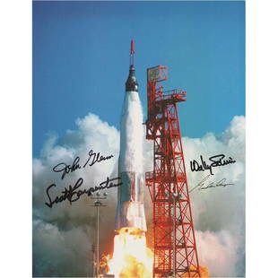 Mercury Astronauts (4) Signed Photograph: Color 8.5 x 11 lithograph of a Project Mercury launch, signed in black felt tip by John Glenn, Scott Carpenter, Wally Schirra, and Gordon Cooper. In fine condition.