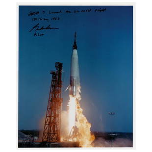 Gordon Cooper Signed Photograph: Color satin-finish 8 x 10 photo of the fiery Mercury-Atlas 9 liftoff, signed in black felt tip, "Faith 7 launch for 22 orbit flight, 15-16 May 1963, Gordon Cooper, Pilot." In very fine condition.