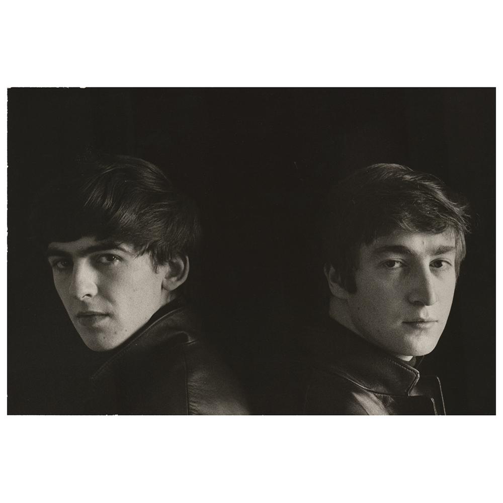 Beatles: Lennon and Harrison Photograph by Astrid: Original vintage glossy 11.75 x 7.75 photo of John Lennon and George Harrison taken by Astrid Kirchherr during the Ã¢€Ëœattic sessionsÃ¢€â„¢ in Hamburg in 1962. The image depicts t