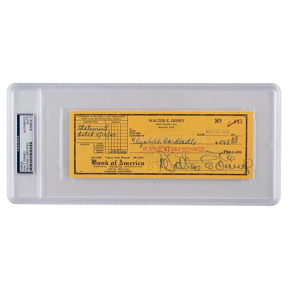 Walt Disney Signed Check: Personal check, 8.25 x 3, filled out in another hand and signed prominently by Disney, "Walter E. Disney," payable to Elizabeth Hardcastle for $1068.64, May 22, 1950. In fine condition. Encapsulated i